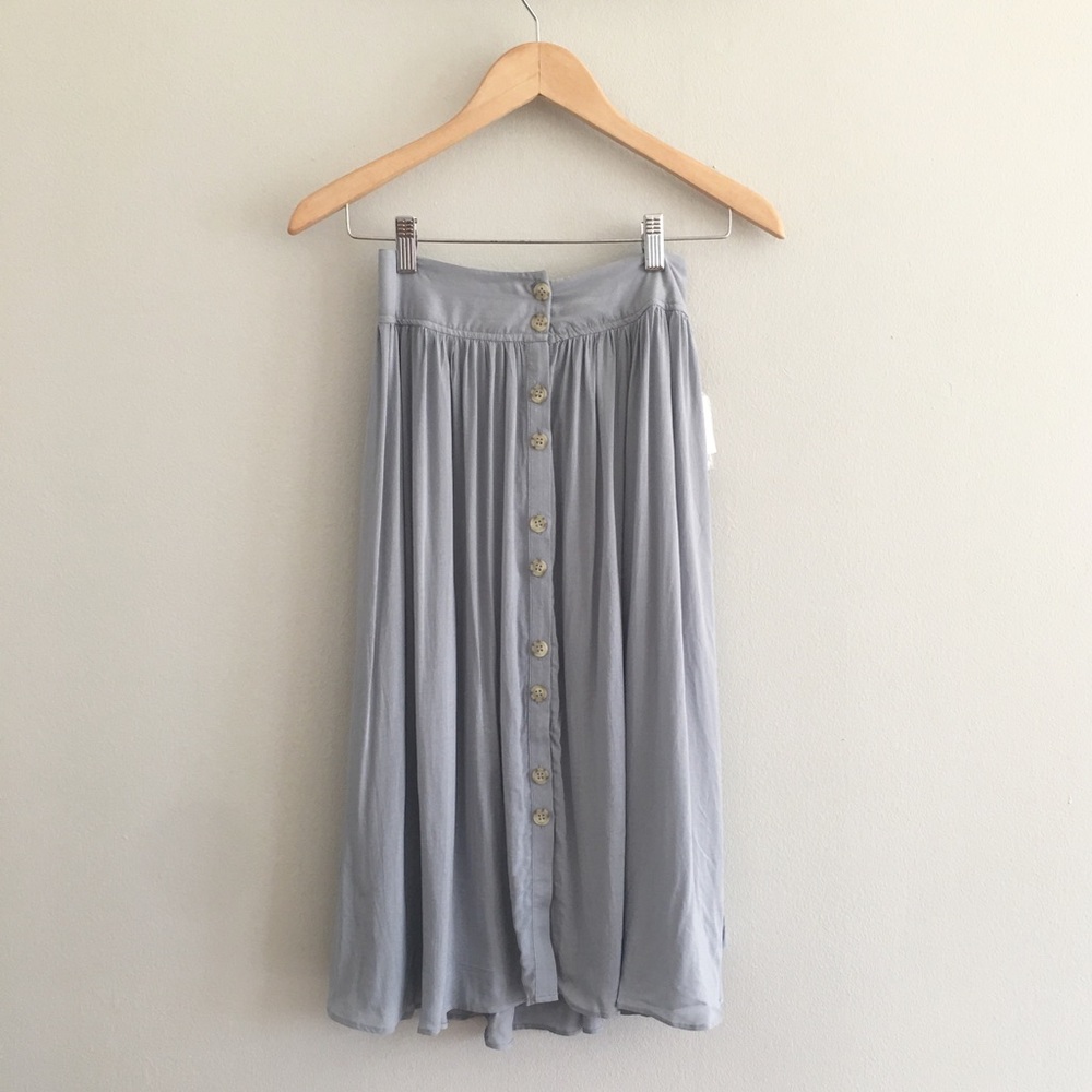 Knee length light blue skirt